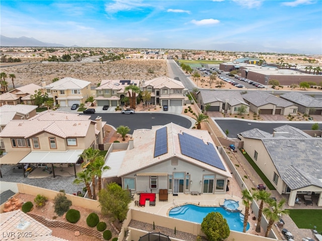 drone / aerial view featuring a mountain view and a residential view