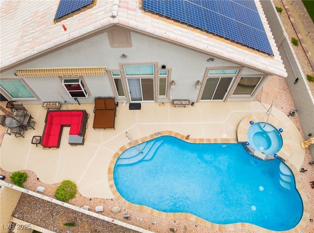 view of swimming pool featuring a patio area