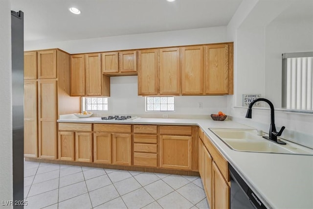 1846 High Mesa Dr, Henderson, NV 89012 - kitchen featuring a sink, light countertops, white gas cooktop, dishwasher, and light tile patterned flooring