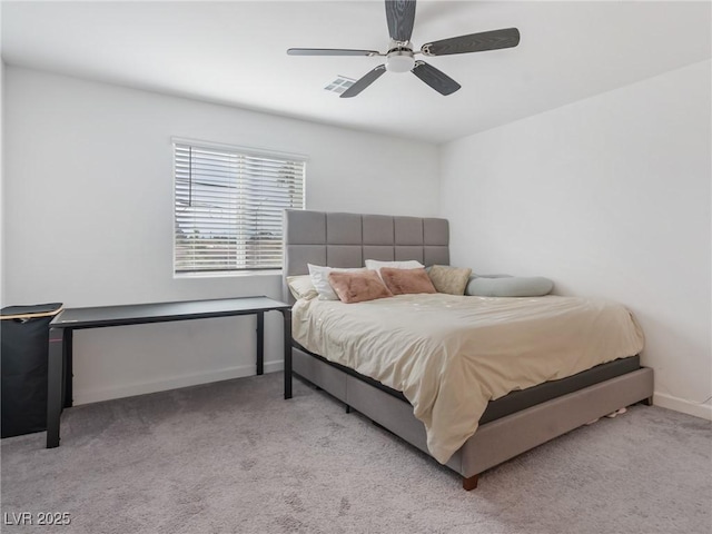 carpeted bedroom featuring ceiling fan, baseboards, and visible vents