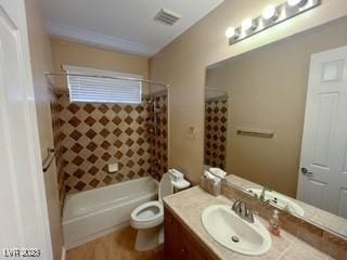 full bathroom with vanity, toilet, visible vents, and shower / bath combo