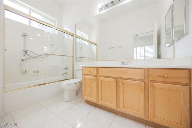 1100 Cypress Ridge Ln, Las Vegas, NV 89144 - bathroom with vanity, toilet, enclosed tub / shower combo, and healthy amount of natural light