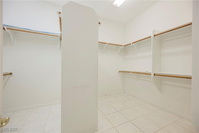 1100 Cypress Ridge Ln, Las Vegas, NV 89144 - walk in closet featuring light tile patterned flooring