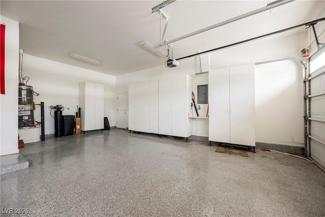 1100 Cypress Ridge Ln, Las Vegas, NV 89144 - garage featuring electric panel, strapped water heater, and a garage door opener
