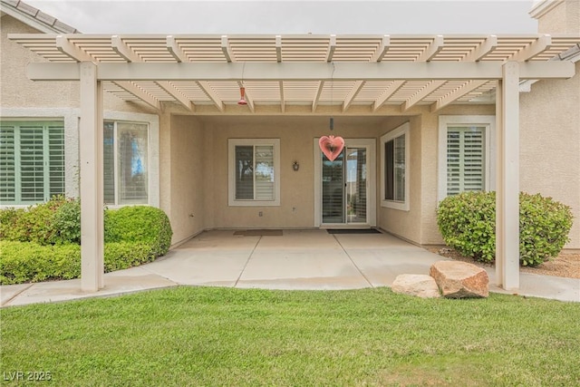 1100 Cypress Ridge Ln, Las Vegas, NV 89144 - view of exterior entry with stucco siding, a pergola, and a patio