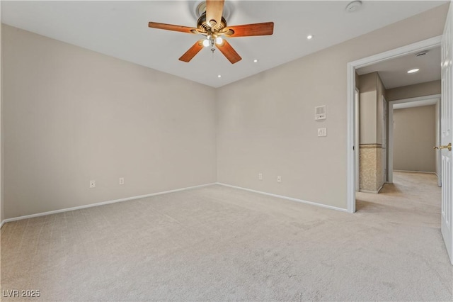1287 Dove Tree Ct, Henderson, NV 89014 - empty room featuring light carpet, baseboards, and ceiling fan