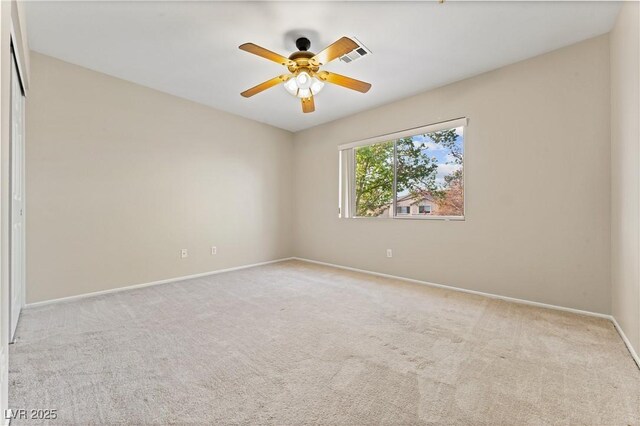 1287 Dove Tree Ct, Henderson, NV 89014 - empty room with carpet flooring, baseboards, and a ceiling fan