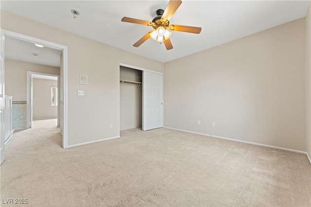 1287 Dove Tree Ct, Henderson, NV 89014 - unfurnished bedroom with ceiling fan, light carpet, baseboards, and a closet