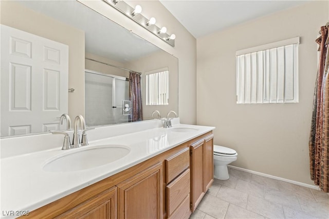 1287 Dove Tree Ct, Henderson, NV 89014 - full bath with double vanity, toilet, baseboards, and a sink