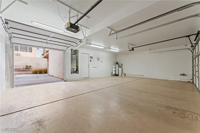 1287 Dove Tree Ct, Henderson, NV 89014 - garage with water heater and a garage door opener
