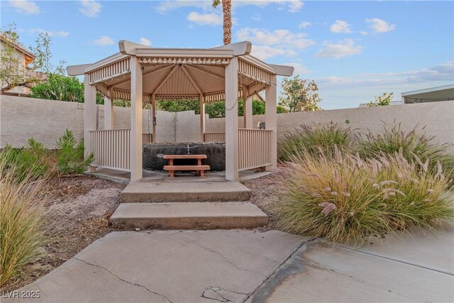 1287 Dove Tree Ct, Henderson, NV 89014 - view of patio featuring a fenced backyard and a gazebo