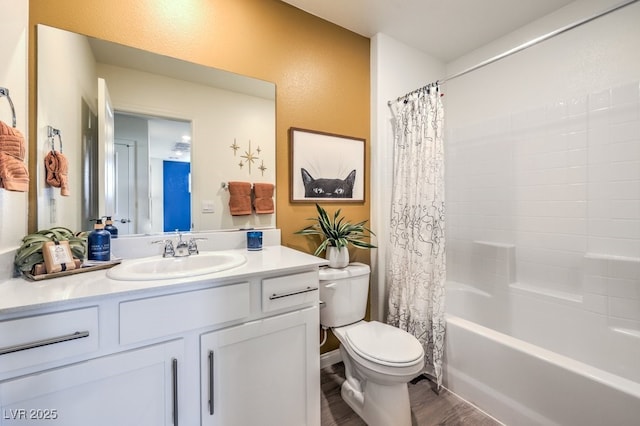 full bath with toilet, vanity, shower / bath combo, and wood finished floors