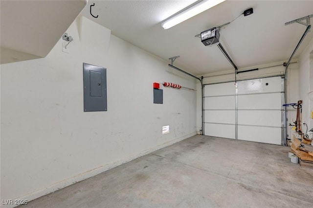 1158 Gecko Rd, Henderson, NV 89002 - garage with electric panel, a garage door opener, and baseboards