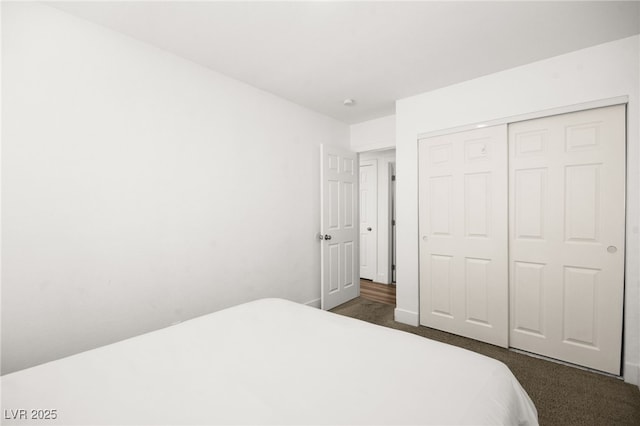 3208 Alcoa Ave, Las Vegas, NV 89102 - bedroom featuring a closet and dark colored carpet