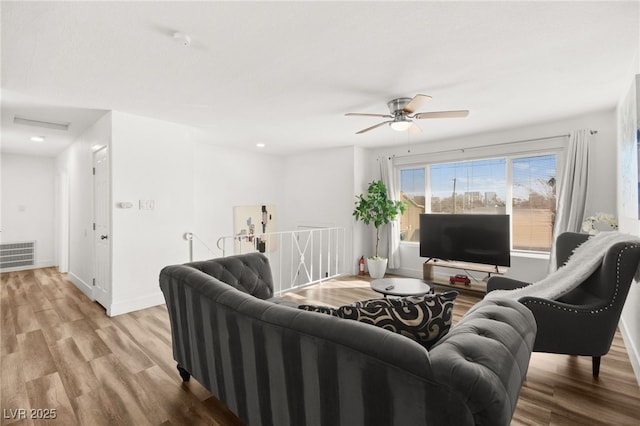 3208 Alcoa Ave, Las Vegas, NV 89102 - living room featuring a ceiling fan, visible vents, and wood finished floors