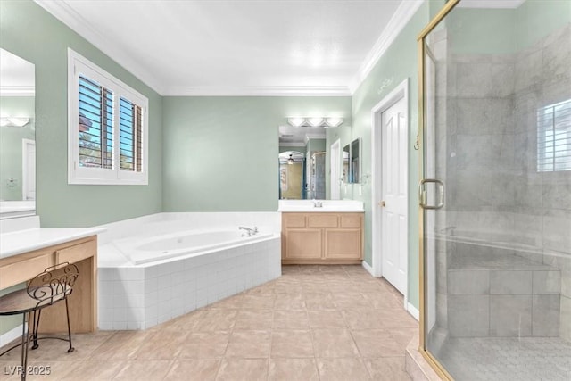 full bath featuring a garden tub, vanity, a stall shower, and crown molding