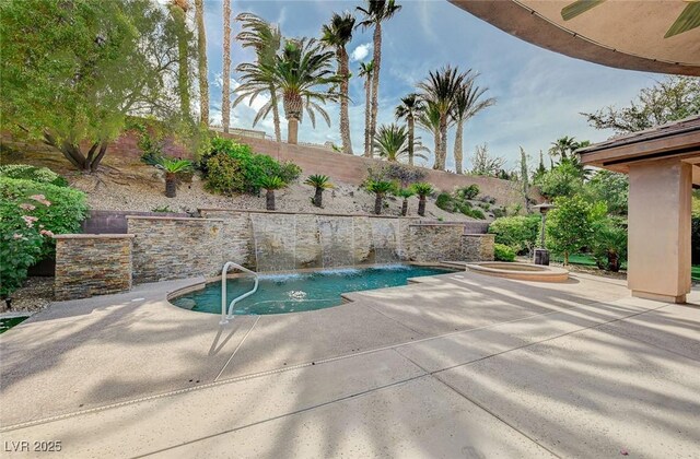 9713 Highridge Dr, Las Vegas, NV 89134 - view of swimming pool with a patio and a fenced backyard