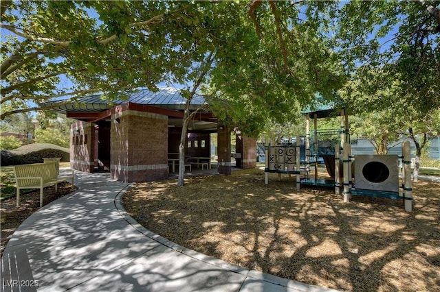 9713 Highridge Dr, Las Vegas, NV 89134 - view of home's community with a playground