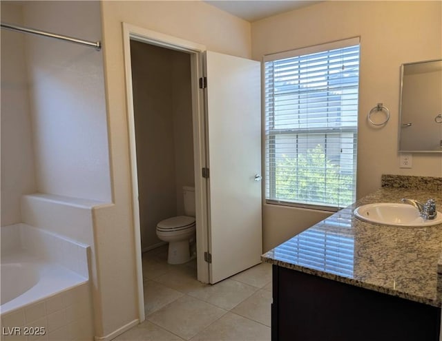 6168 Scarlet Leaf St, Las Vegas, NV 89148 - full bath with tile patterned flooring, plenty of natural light, a bath, and vanity