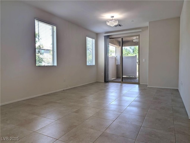 6168 Scarlet Leaf St, Las Vegas, NV 89148 - unfurnished room featuring tile patterned flooring and baseboards