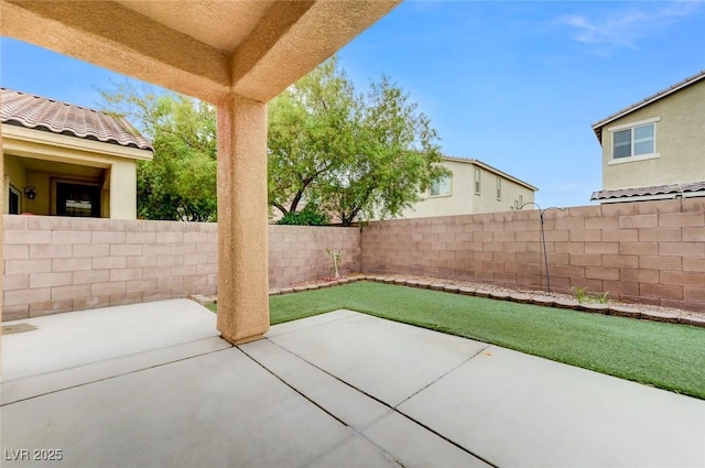 view of patio featuring a fenced backyard