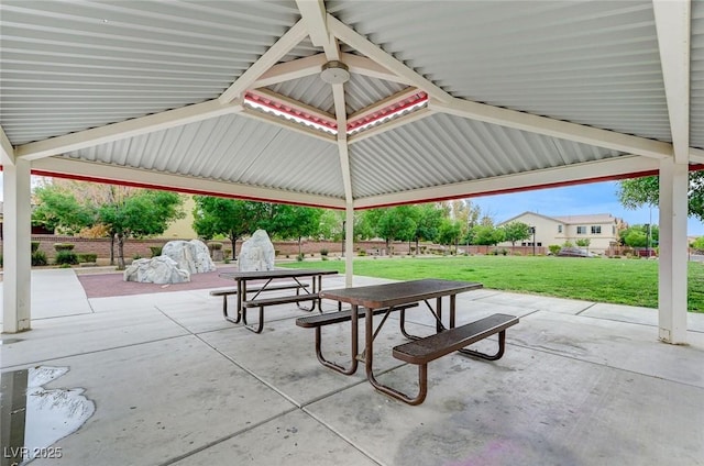 view of patio / terrace with outdoor dining space and fence