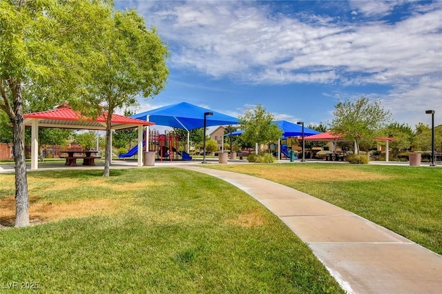 view of community with a lawn, a gazebo, and playground community