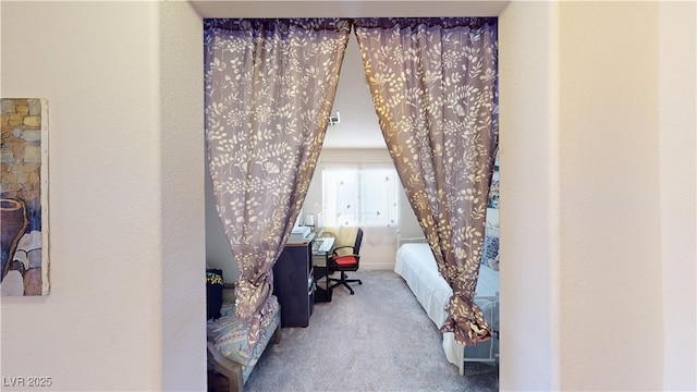 bedroom featuring carpet