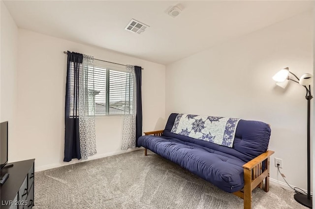 carpeted living room with baseboards and visible vents