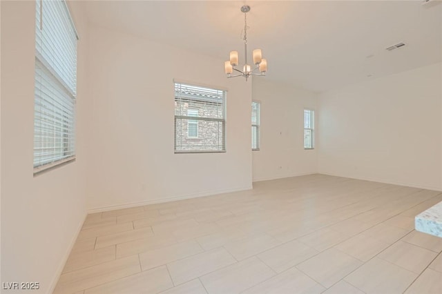 790 Sunny Sagebrush St, Henderson, NV 89011 - spare room featuring baseboards and a notable chandelier