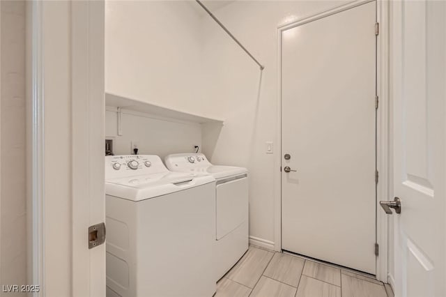 790 Sunny Sagebrush St, Henderson, NV 89011 - clothes washing area with separate washer and dryer and laundry area