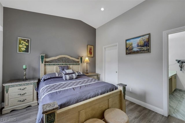 bedroom featuring lofted ceiling, baseboards, recessed lighting, and wood finished floors