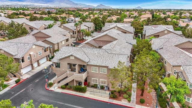drone / aerial view with a mountain view and a residential view