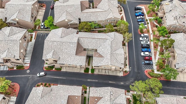 birds eye view of property with a residential view