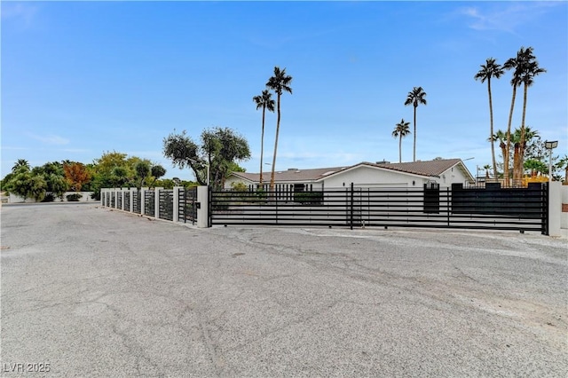 view of road featuring a gate