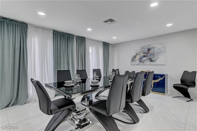dining area with recessed lighting