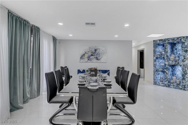 dining room featuring recessed lighting and light tile patterned flooring