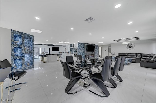 dining space featuring recessed lighting