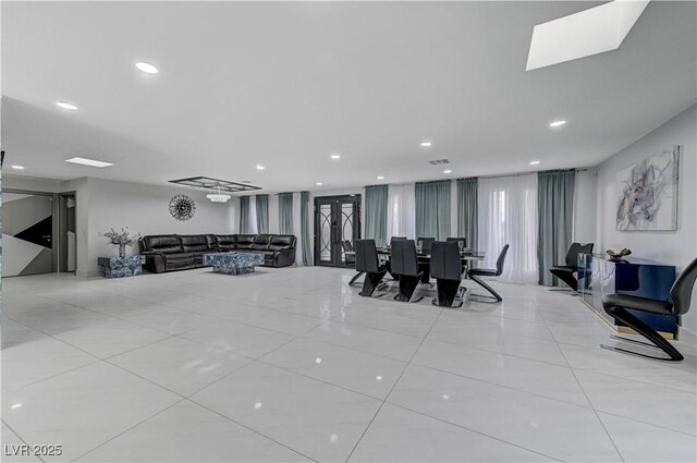 dining area featuring recessed lighting