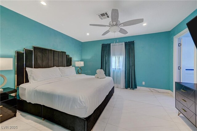 bedroom featuring recessed lighting, ceiling fan, light tile patterned flooring, and baseboards