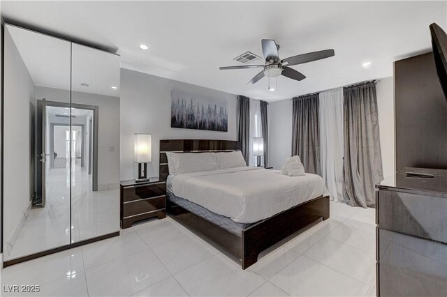 bedroom with light tile patterned floors, recessed lighting, and ceiling fan