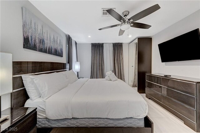 bedroom featuring ceiling fan and recessed lighting