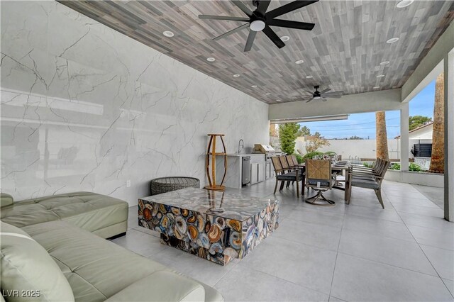 view of patio featuring outdoor dining space, ceiling fan, and outdoor lounge area