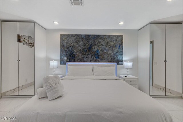 bedroom with recessed lighting