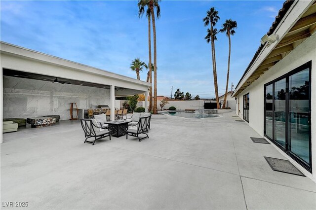 view of patio / terrace with outdoor dining area and a fenced backyard