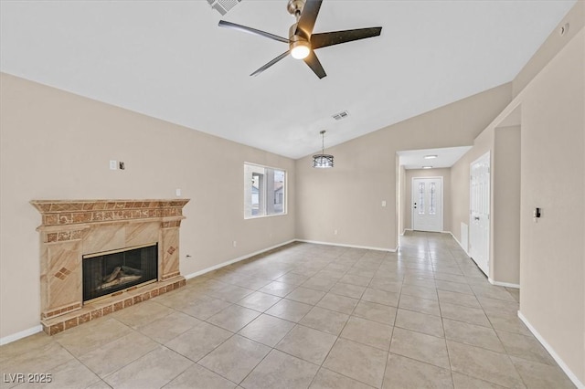 5820 Royal Castle Ln, Las Vegas, NV 89130 - unfurnished living room with light tile patterned floors, a ceiling fan, a fireplace, visible vents, and lofted ceiling