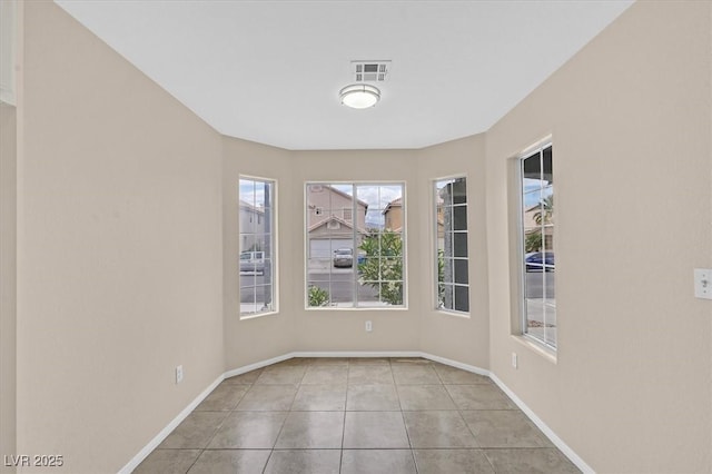 5820 Royal Castle Ln, Las Vegas, NV 89130 - spare room featuring tile patterned floors, visible vents, and baseboards