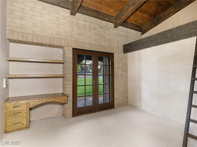 entryway featuring wooden ceiling, french doors, beamed ceiling, and carpet floors