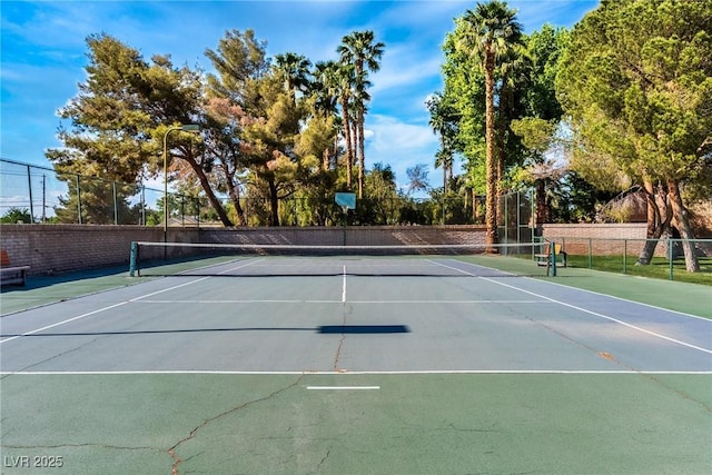 view of sport court with fence and community basketball court