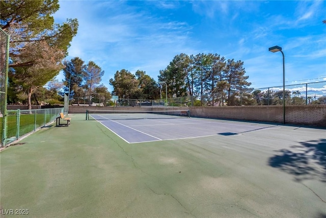 view of sport court with fence and community basketball court